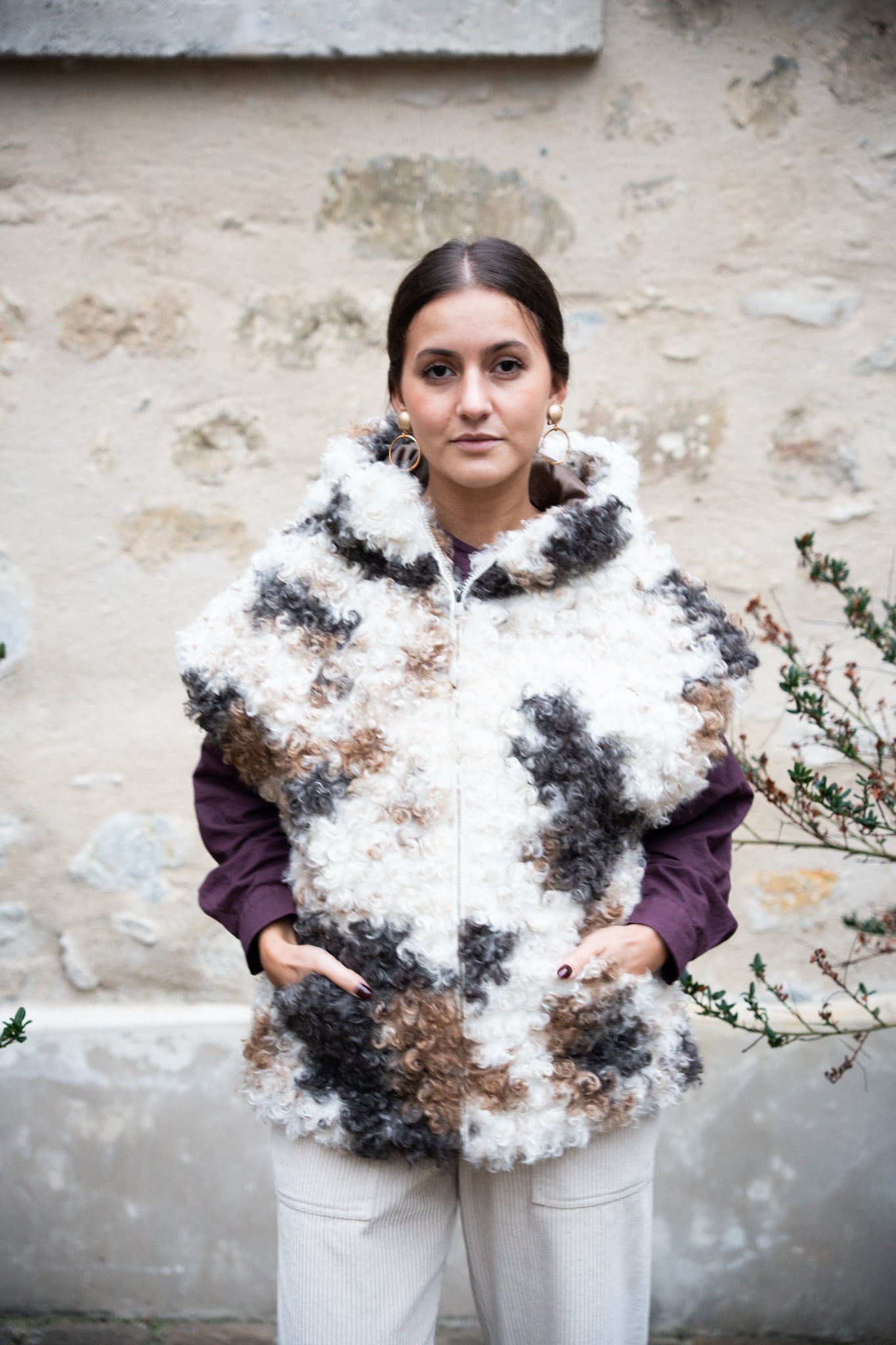 Veste sans manche à capuche