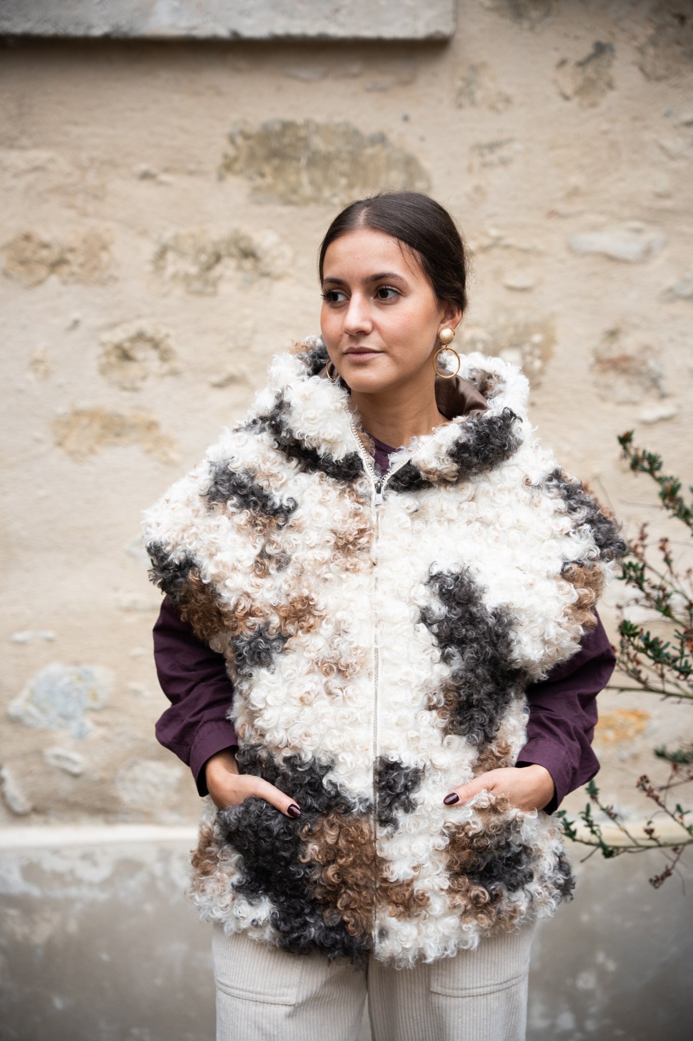 Veste sans manche à capuche